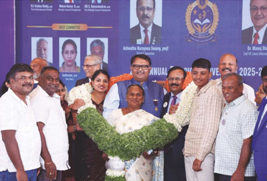 District Governor with Home Club Members
